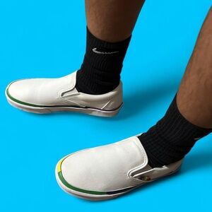 Vans White Slip-On Sneakers with Rainbow Trim